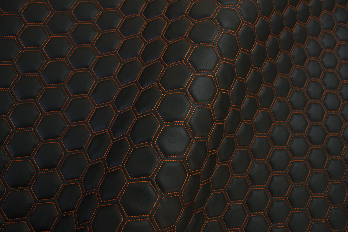 Orange Quilted Black Vinyl Faux Leather Car Upholstery Fabric | 2" x 5cm Hexagon Pattern Stitch with 5mm Foam Backing | 140cm Wide | Automotive