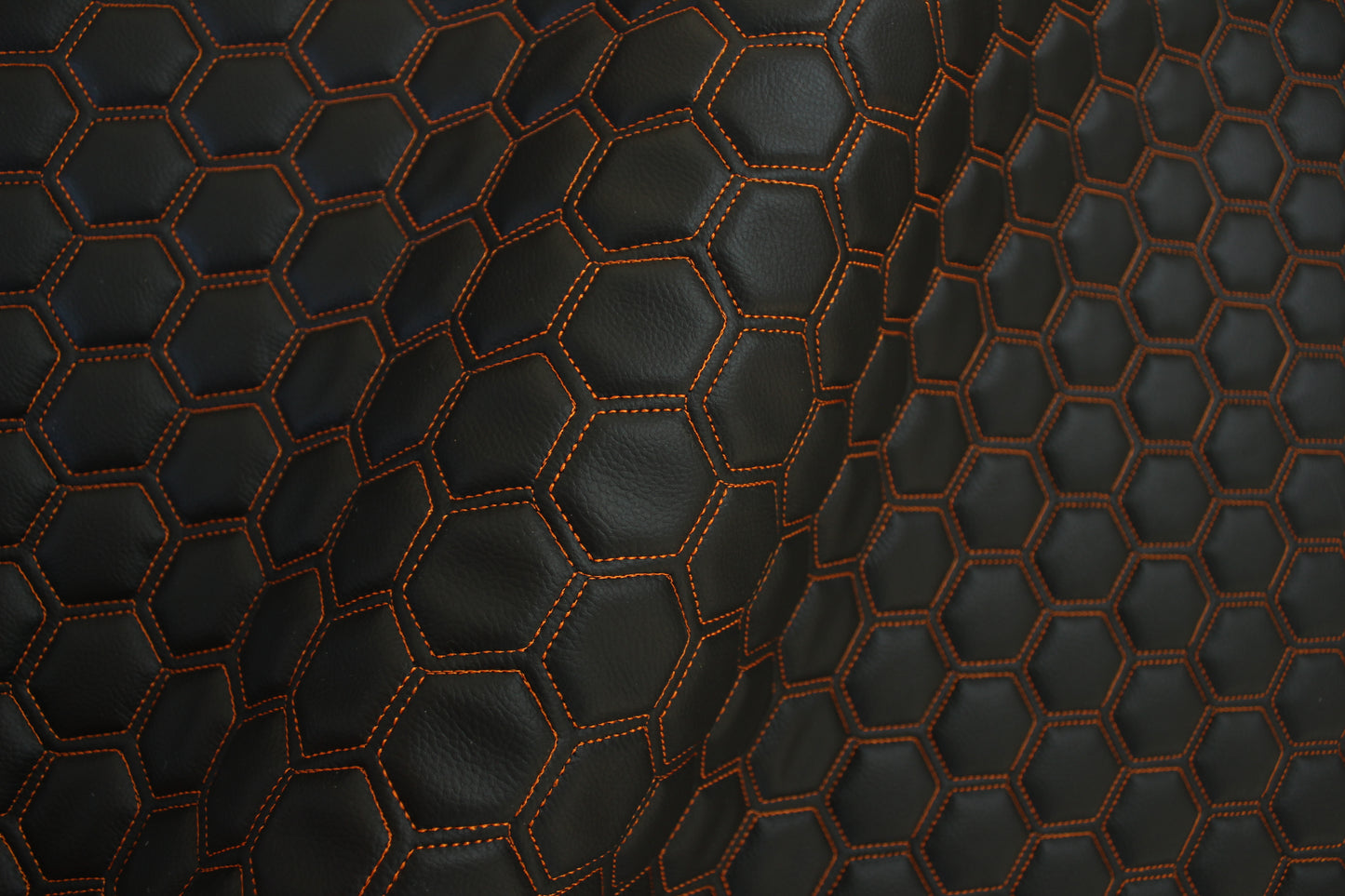 Orange Quilted Black Vinyl Faux Leather Car Upholstery Fabric | 2" x 5cm Hexagon Pattern Stitch with 5mm Foam Backing | 140cm Wide | Automotive