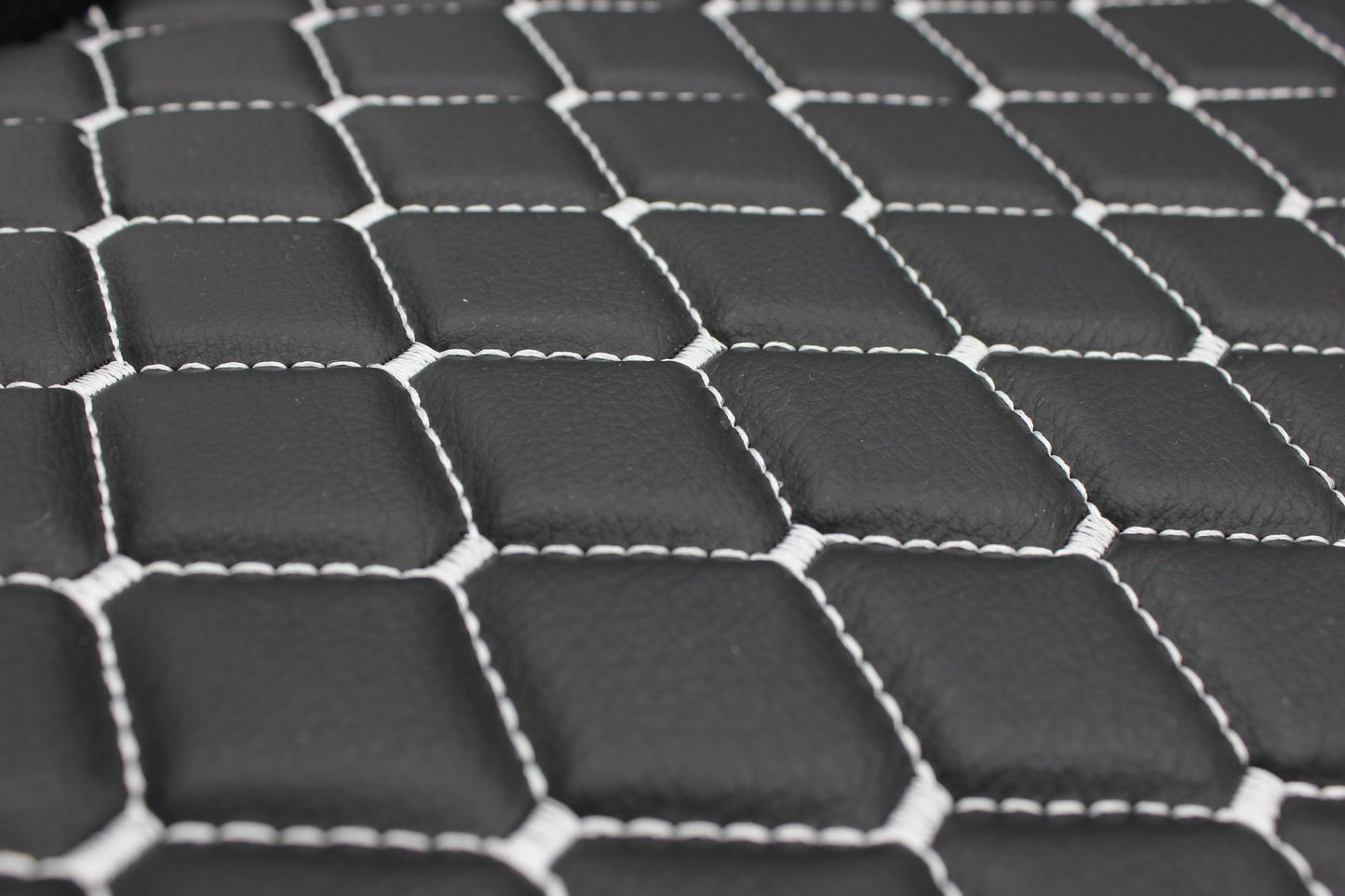 white-quilted-black-faux-leather-upholstery-fabric-diamond